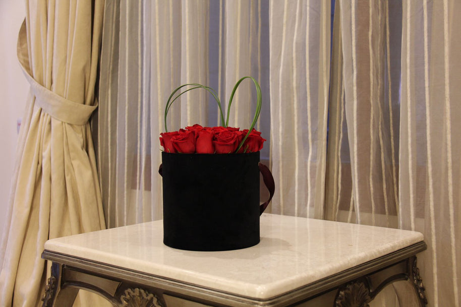 Red Roses bouquet Flowers in bag shaped box