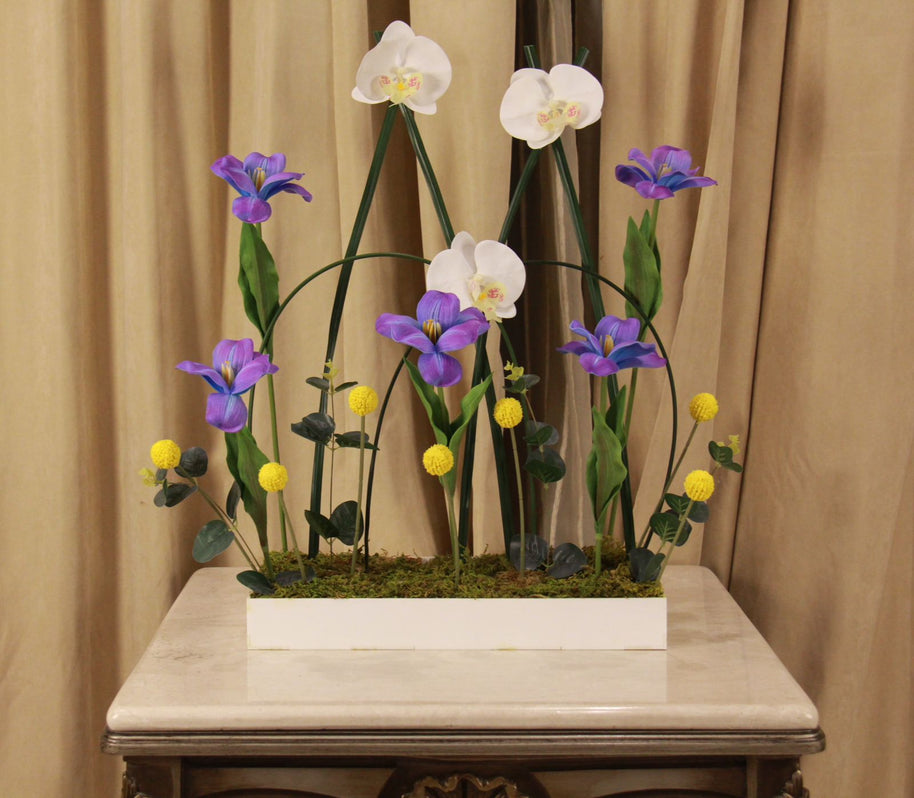 Blue Tulips with artificial Orchids in white acrylic box