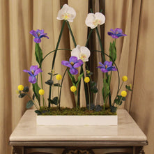 Blue Tulips with artificial Orchids in white acrylic box